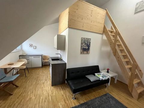 The stylish attic apartment with gallery is located in a particularly beautiful, newly built, light-flooded atrium complex with a wonderful inner courtyard. It is fully furnished with a modern box spring bed, fully equipped kitchenette, table, chairs...