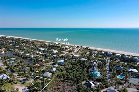 An exceptional near beach parcel with good elevation, that also backs up to preservation land to ensure supreme privacy in perpetuity. This ideal cul-de-sac location is just steps to deeded beach access across from the entrance to this small communit...