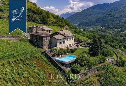In a wonderful mountain town in Valtellina, in the heart of the Alps, there is this stunning panoramic villa with a pool for sale just a few minutes from the Aprica ski slopes, with over 50 km of tracks. Considered the gastronomic capital of the Vall...