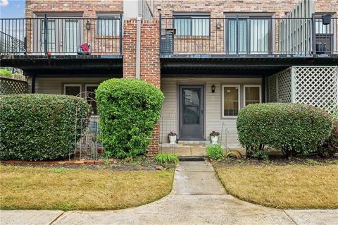 Just renovated! This condo in the very desirable Georgetown of Atlanta will wow you! The 2 bedroom, 1 bath stepless flat has a modern feel with it's contemporary finishes, yet has a timeless charm. Brand new kitchen, bath, floors, paint...you will be...