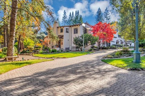 Welcome to this spectacular Spanish Colonial Estate sitting on over 2 flat acres of manicured grounds. It was the cherished home of a Silicon Valley Pioneer and his family for over 50 years! The 1930s home was preserved and additions were done by loc...