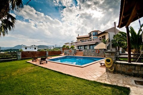 Located in Agios Nikolaos. A luxury 4 bedroom villa, located on the outskirts of the cosmopolitan town of Agios Nikolaos. This impressive villa stands on a private plot on a hillside offering panoramic views of the town of Agios Nikolas and the Mirab...