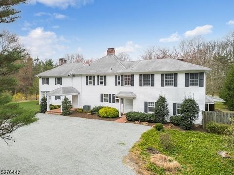 Introducing 66 Lake Rd- your private retreat on 15+ acres of farm assessed property in prestigious Far Hills, NJ. As you enter the property, a dramatic tree lined winding drive leads you to the magnificent colonial and the updated barn. The main hous...