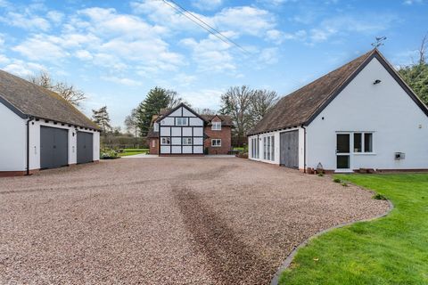 An exceptional detached country residence positioned on the outskirts of the highly desirable village of Redmarley. This property boasts generously sized living spaces including three reception rooms and a stunning breakfast kitchen. Four double bedr...