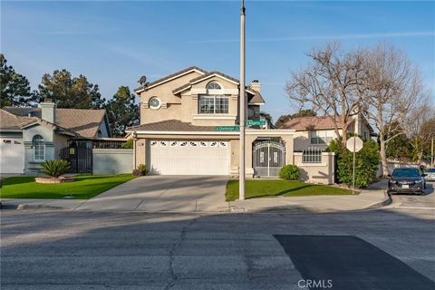 A gorgeous corner lot, two-story home located in the community of Rancho Cucamonga. As soon as you walk through the door entry, you will find yourself in a great living room with a beautiful fireplace that invites you to enjoy the light coming from t...