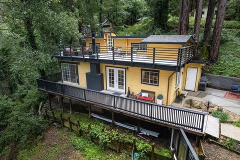 Charming retreat nestled among towering redwoods, offering an idyllic blend of tranquility and modern comfort, with the San Lorenzo River as a serene backdrop. Remodeled kitchen with granite counter tops, island with breakfast bar, second prep sink. ...