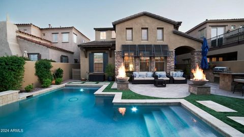 Welcome to your dream oasis! Nestled in the heart of DC Ranch in North Scottsdale, this luxury home boasts a state-of-the-art, sparkling, saltwater pool surrounded by high-quality synthetic grass, custom travertine, built in gas BBQ, and two impressi...