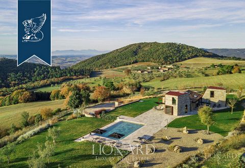 This luxurious stone villa with a heated pool is for sale near Volterra, Tuscany. Immersed in a splendid landscape, surrounded by woods and olive groves, this villa is the result of the renovation and expansion of a typical Tuscan farmhouse and also ...