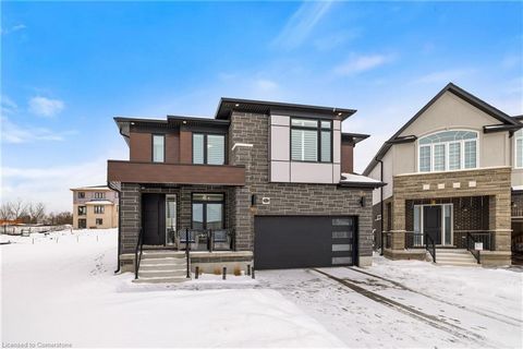 Welcome to the prestigious Trussler Woods area of Kitchener! This stunning, recently built home boasts an impressive array of features that make it stand out. With four spacious bedrooms, each with its own ensuite bathroom or ensuite access, this hom...