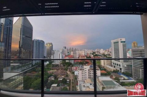 Stylish and modern two bedroom, two bath condo for sale in a luxury class condominium. Excellent location - MRT Phetchaburi a short 350m walk and it is near Airport Link Makkasan at 700m. Situated on the 20th floor the unit faces east with a beautifu...