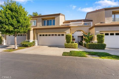 Step into this charming townhome and experience the true meaning of comfort and style. The moment you enter, you're greeted by a bright great room featuring soaring cathedral windows that flood the space with natural light, creating an inviting, cozy...