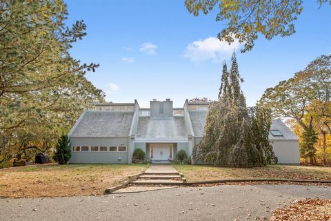 Experience Hither Hills living in this versatile retreat, offering 3 bedrooms and 3 baths, plus a dedicated office and cedar sunroom - perfect for those looking to blend work and hobbies under one roof. The double-height living room invites in natura...