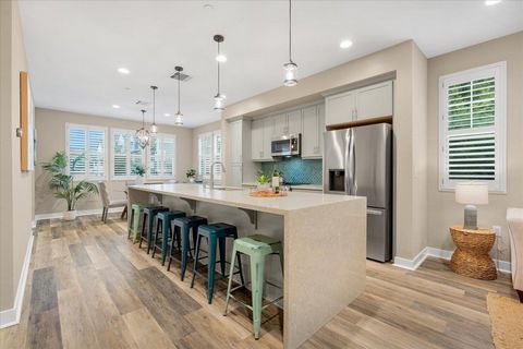 This Executive Townhouse offers 4 bedrooms, 3.5 bathrooms, and 2200 sq ft of meticulously designed living space in the heart of Scotts Valley. Soaring high ceilings create an expansive, bright, & open atmosphere. Gorgeous upgrades throughout, the gou...