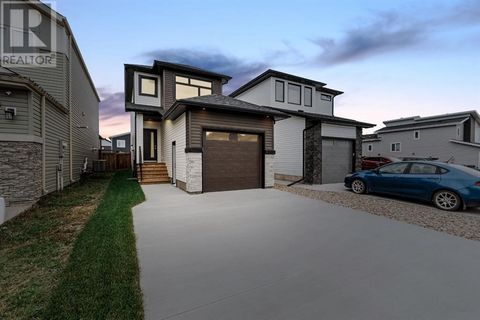 Welcome to 145 Athabasca Crescent: An elevated and modern design inside and out, this New Home is untouched and ready for itâs first owners with a bright open floor plan, custom built ins and features throughout, an attached garage with long driveway...