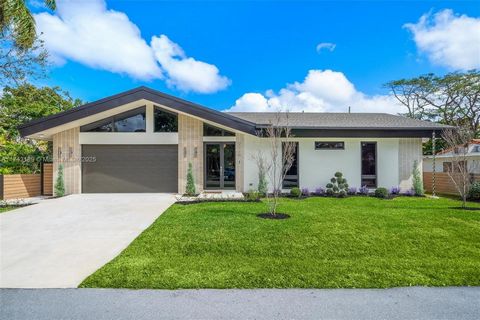 Experience luxury living in this stunning new construction home in desirable Wilton Manors! Featuring Mid-Century Modern-inspired architecture with gorgeous vaulted ceilings. This 3-bed2.5-bath home boasts a gourmet kitchen with a 5' x 9' quartz wate...