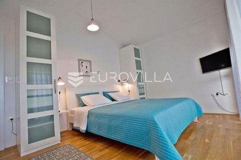 Stobreč, one-bedroom apartment on the second floor of a small residential building. The apartment, 40 m2, consists of a hallway, bathroom, kitchen and dining room, and a separate bedroom. The apartment also has one outdoor parking space. All utilitie...