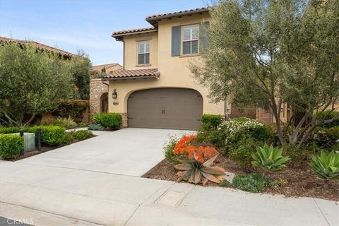 Nestled in hills of San Juan Capistrano in the sought after gated community of Campanilla, this charming three bedroom, two and a half bath home has much to offer! Upon arriving, you will enter through the arched gate into the private walkway with bu...