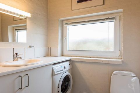 Holiday home only 100 meters from the outermost dunes by the North Sea and just south of Hvide Sande. The cottage has a wonderful rustic and practical decor with tiled floors and water-scrubbed walls. The large living room, which is combined with the...