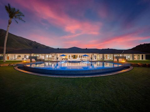 Commanding one of the largest and most remarkable panoramic ocean views anywhere in the Hawaiian Islands, the residence at 426 Wailau occupies a truly iconic location in the uppermost heights of Launiupoko. This 25 + acre mountain top retreat offers ...