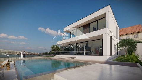 A unique opportunity luxury villa with a pool, first row to the sea On the island of Pag, right next to the sea, there is a beautiful luxury villa with a spacious infinity pool that gently goes into the horizon, creating a fairytale scene. This prope...
