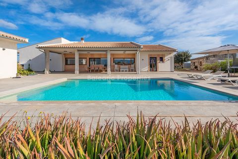 Chic country villa with versatile guest accommodation in Sa Pobla This single storey finca, constructed in 2022, occupies a plot of around 22.000m2 and is offered for sale in a peaceful area of Sa Pobla. It comprises the main residence, a barbecue ho...