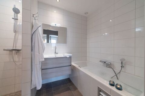 This spacious apartment in Colijnsplaat has 2 bedrooms for 4 people. It is ideal for families and guests can experience ultimate relaxation in their own wellness area with a sauna, whirlpool and lavish walk-in shower. You can start the day with a wal...
