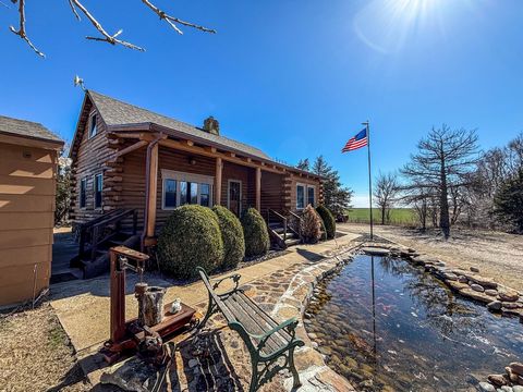 Location: Located 4.5 miles south of Larned, KS and 1 mile west of Highway 19 in Pawnee County. Property Address: 846 120th Ave., Larned, KS 67550Nestled on +/- 4.2 acres, this charming log cabin home offers a peaceful retreat if you are looking for ...