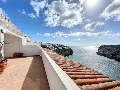 Lucas Fox presents this charming 64m² apartment with a 24m² terrace in a unique and incredible location, built on the cliff and overlooking the beautiful white sand beach of Cala'n Porter. It has a spacious and very bright dining room living room wit...