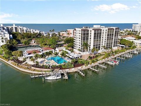 This exquisite condo is located in the highly desirable 10 acre amenity-rich enclave of Admiralty Point, which offers Bay and PRIVATE BEACH ACCESS, SUNRISE AND SUNSET POOLS, boat slips and 24-hour security. The condo offers an expanded lanai overlook...