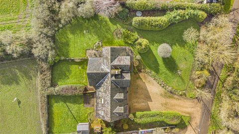 A fantastic opportunity to purchase a Victorian five-bedroom detached property with a separate annexe/studio, and a two-acre paddock in a rural location enjoying far-reaching views over open countryside. Approached over a sweeping gravel driveway, wh...
