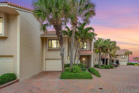 BEACH AND SAND steps away from your home at Dunes of Ocean Ridge! This spectacular and exclusive gated beachside community of only 36 homes steps from the Ocean delivers this 3 bed, 2.5 bath two-story townhome with an unparalleled blend of modern ele...