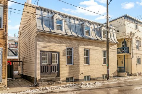 UNIQUE IN ST-SAUVEUR! Spacious property with 5 bedrooms, 2 full bathrooms and 1 powder room. Arranged on 3 levels, this vast residence has great advantages. High ceilings, powerful character, exposed stone wall, large backyard with independent storag...