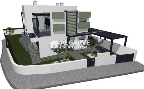 Located in Olhão. Imposing duplex villa in an individual plot in project phase. The beautifully landscaped garden surrounds the whole house, and there is also having a shelter for 2 cars on the left side of the house. With 200 sqm of construction, th...