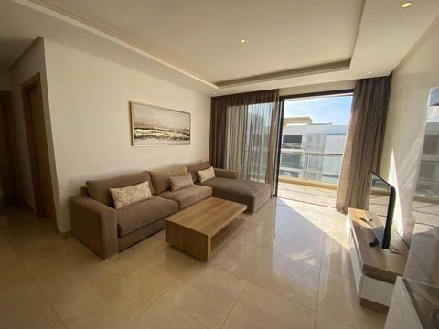 Located in Bouknadel. This beautiful apartment offered for rent is located in a secure and peaceful residence, in the seaside resort of Plage des Nations, just 20 minutes from Rabat. Located on the third and top floor, the apartment offers a magnific...