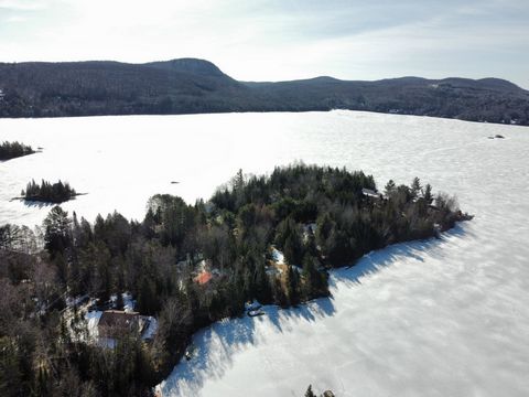 WATERFRONT. Land located on a peninsula in the large bay of the coveted Lac Labelle with an area of more than 25,900 square feet. Its topography is ideal for the construction of a high-rise chalet that will offer a view to contemplate the rising and ...