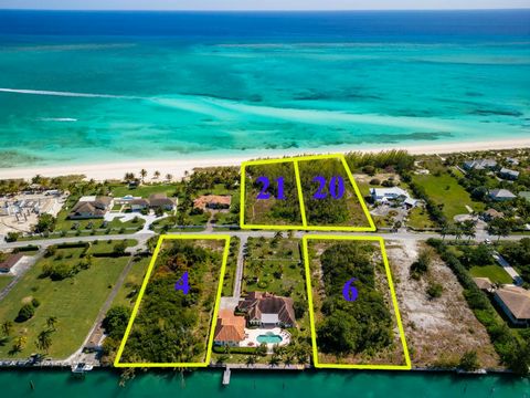 Discover the epitome of luxury with this unique opportunity to own four exquisite lots on prestigious Spanish Main Drive in Freeport Grand Bahama. This unparalleled land offers the perfect fusion of canal-front tranquility and beachfront bliss, creat...