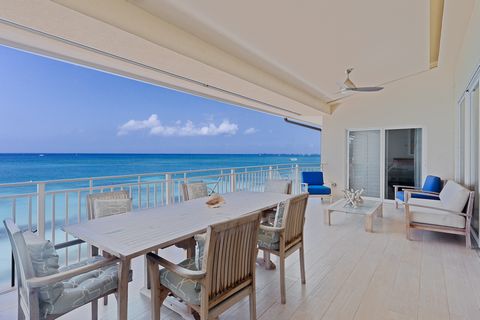 Discover a Caribbean gem nestled within the esteemed Laguna Del Mar community. Step into this exquisite penthouse on Seven Mile Beach, where breathtaking vistas of turquoise waters welcome you. With lofty 10-foot ceilings and abundant natural light, ...