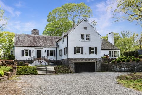 Uniquely Private Armonk Estate w/Pool and Tennis on secluded 5+acres in Byram Hills SD. The meandering gravel driveway leads to this beautifully renovated 3 BR stone and brick manor house, w/heated inground pool, Har-Tru tennis court and separate gue...