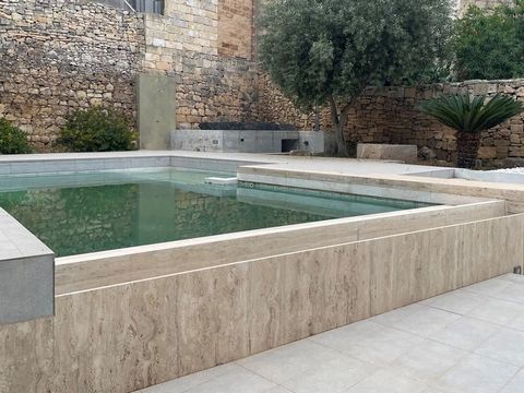 Situated in a very quiet street in Qormi one finds this unique House of Character overlooking a peaceful 250sqm courtyard with pool and garden which has been expertly converted into a family home with no expense spared. The 475 sqm property with a bu...