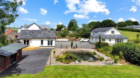 Located in the serene hamlet of Hiscott, a mere five miles south of the bustling town of Barnstaple, lies Lower Court, a property that exudes a unique blend of rustic charm and contemporary elegance. This detached barn conversion, realised in 2005, h...