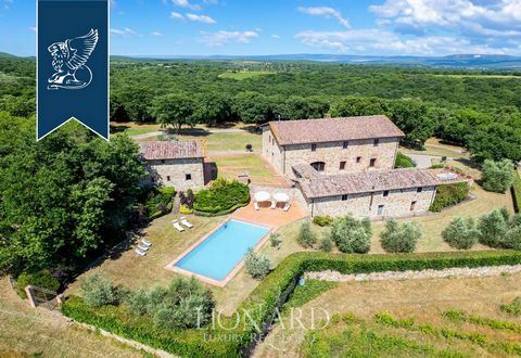 This luxurious Tuscan farmhouse, located in Siena's picturesque countryside near Bucine, is now for sale. The property features a main villa, an annex, and an outbuilding, all designed in traditional Tuscan style with exposed stone façades, terr...