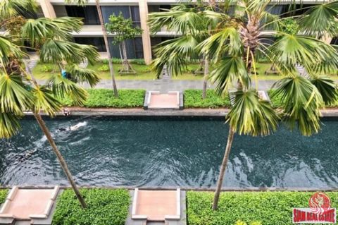 A luxury beachfront condominium for sale situated right on Mai Khao Beach. This two bedroom, two bath condo is almost 99 sqm in size with lots of space in each room. The unit is elegantly decorated in pleasing beige tones. There is an open living pla...