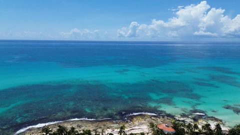 Located in one of the most exclusive and serene areas of Cancun, this stunning beachfront property combines the majesty of the ocean with the comfort of a private oasis. Distributed over 2500 m2 of land, with an impressive façade of 151 meters deep a...