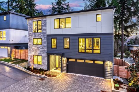 Experience the epitome of luxury living in the heart of Kirkland's sought-after Houghton neighborhood! This stunning new construction home, crafted by the renowned Chaffey Building Group, offers a harmonious blend of modern elegance & timeless design...