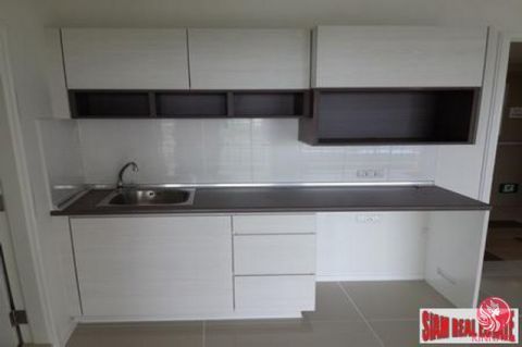 This 32sqm unfurnished apartment is on the cooler north side of the building on the 12th floor. The building is a beach front tower and there is a sea view from the bedroom. There is also a balcony. There are two Daikin air conditioners. There are ti...