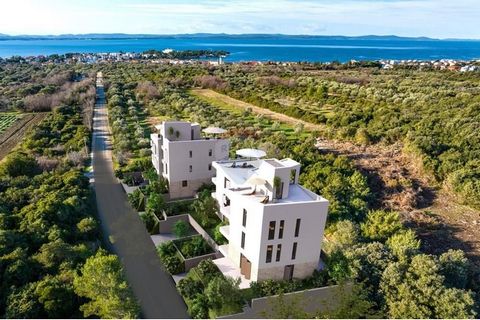 Location: Zadarska županija, Zadar - Okolica, Petrčane. Apartment S3 consists of an entrance, two bedrooms, two bathrooms, kitchen, dining room and living room and a large covered terrace with a beautiful view of the sea and islands! Building and apa...