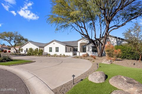 Experience the pinnacle of luxury living in the heart of Paradise Valley! This extensively renovated 2024 masterpiece feels like a new build, offering a fresh, modern design and impeccable craftsmanship. Nestled on a pristine acre with breathtaking M...