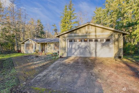 Wonderful opportunity to build some sweat equity in Port Townsend! Located on 2.73 acres, with a shop. The single level home was built in 2005 and has an attached 2 car garage. Open concept living with 3 bedrooms and an office. In need of a little TL...