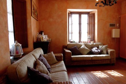 Located amidst Tuscan hills, this 4-bedroom villa in San Romano in Garfagnana has stone exteriors and comfortable amenities inside. It can accommodate 8 people and is perfect for a large family. You can cool off in the private swimming pool with bubb...