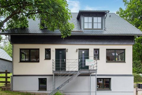 This spacious holiday home is located in the municipality of Friedrichshöhe, a district of Eisfeld. The house has all the amenities you need and a wood stove in the living area creates a cosy atmosphere. The terrace and garden are the perfect place t...